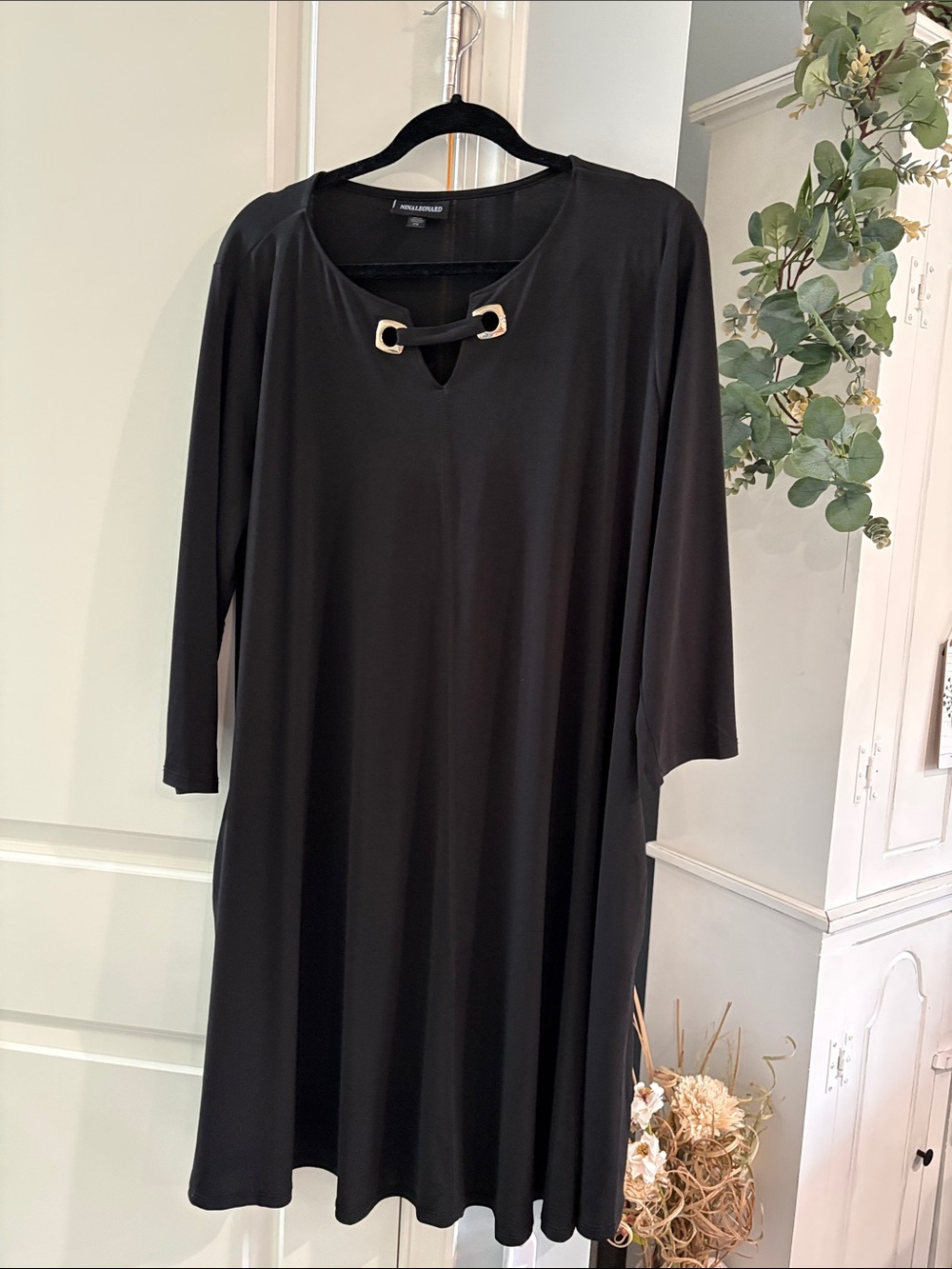 Nina Leonard Black Long-Sleeve Shift Dress with Gold Grommet Detail